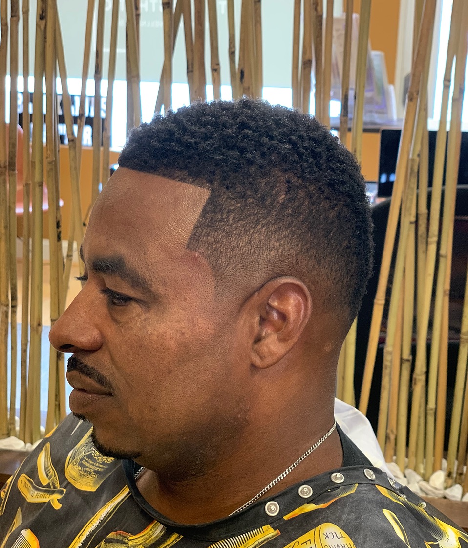 A Select Styles client with a finished haircut